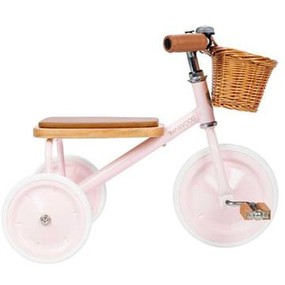 Tricycle vintage en métal rose